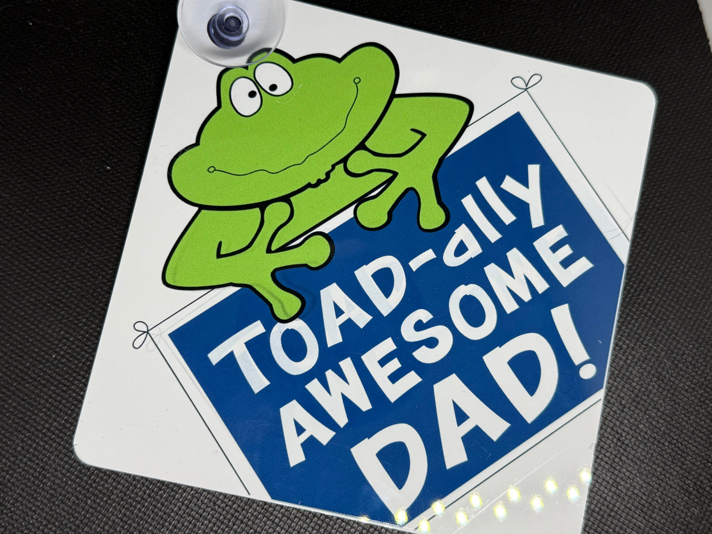 Car Sign with a green frog and 'Toad-ally Awesome Dad!' 