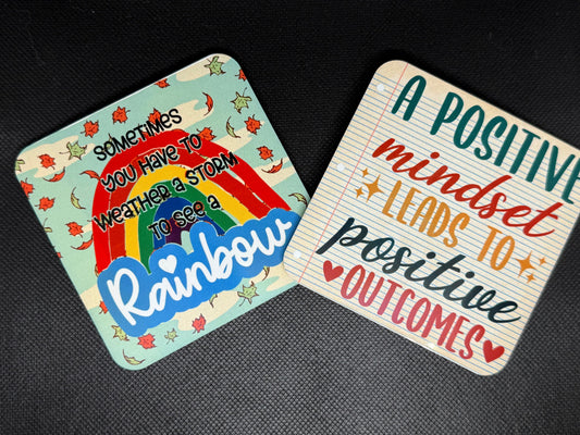 Motivational coasters on a cork base